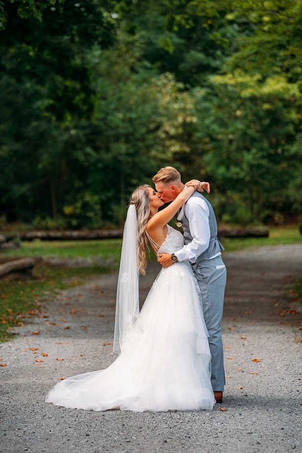 bride and groom kissing